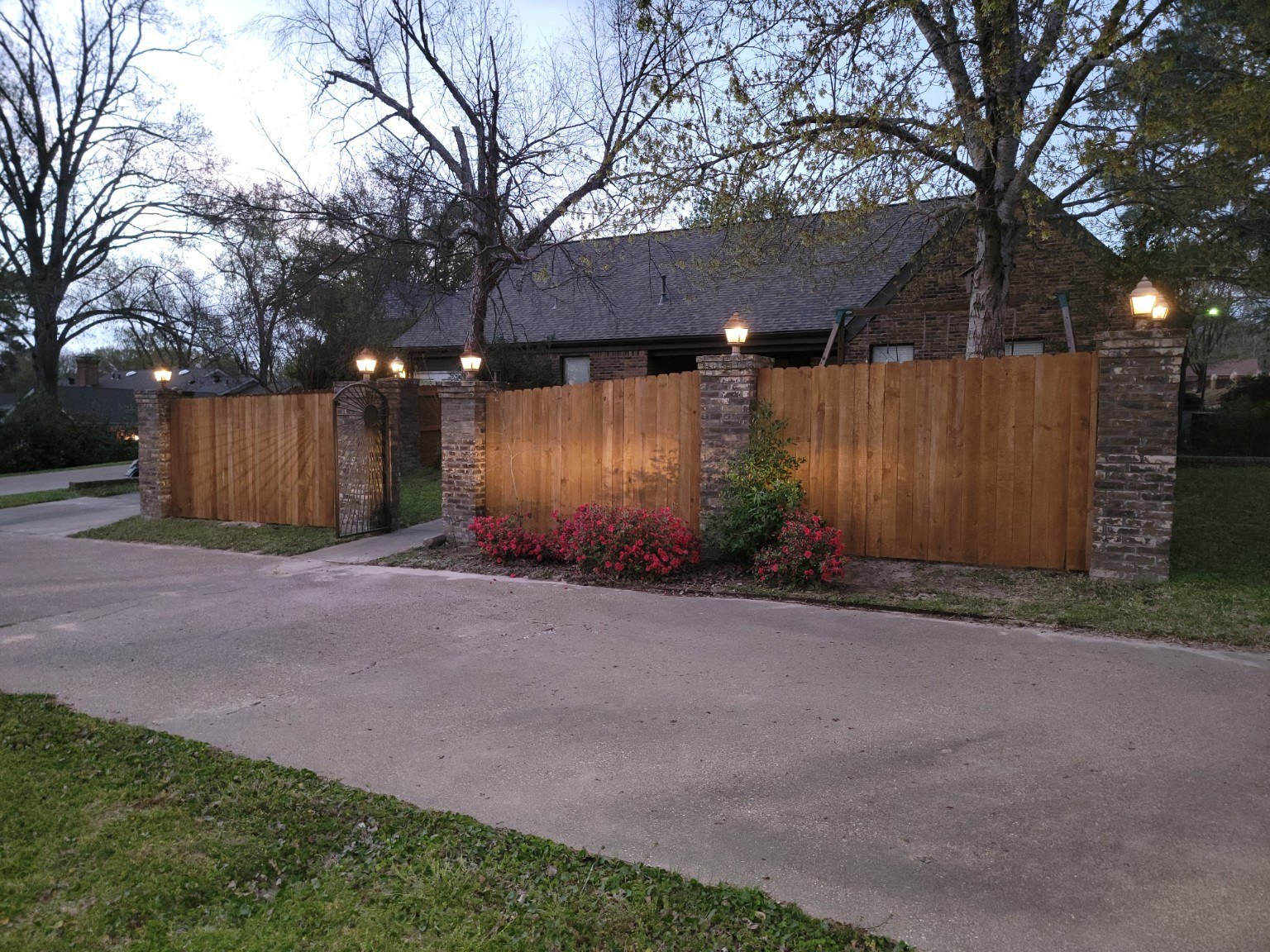 Completed wood privacy fence with gate