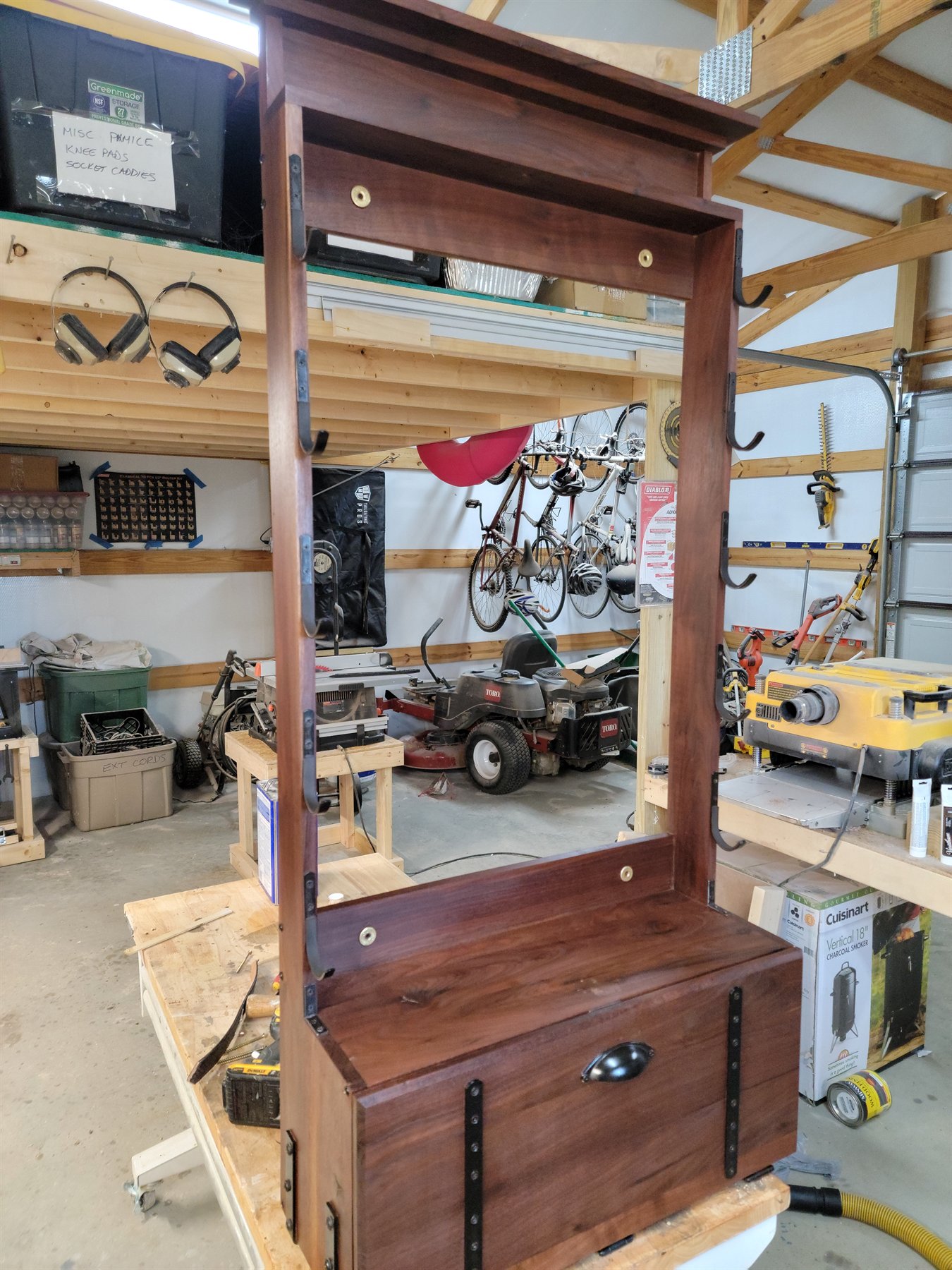 Custom black walnut rifle rack and locking storage cabinet