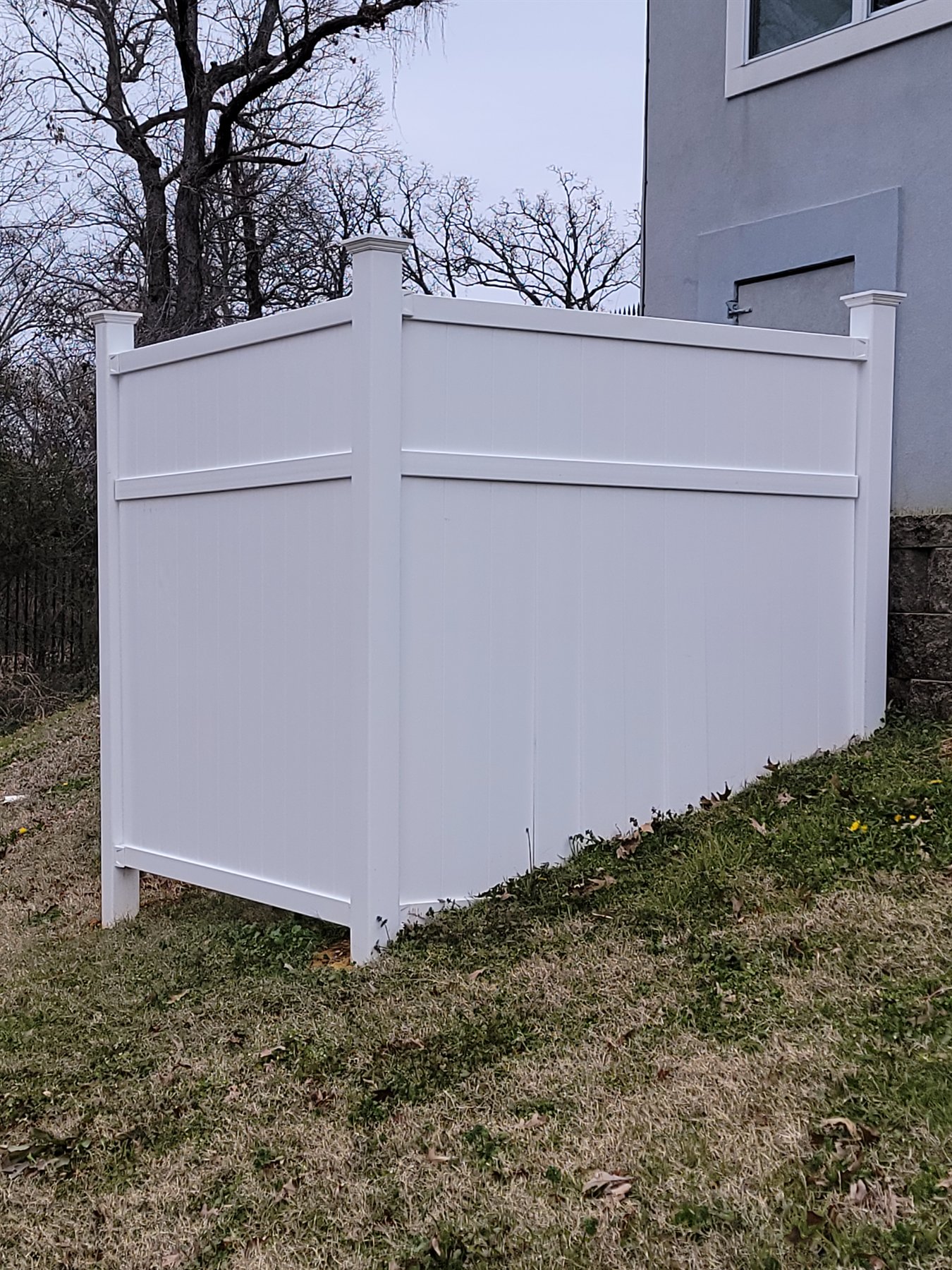 Custom privacy fencing built to screen outdoor equipment